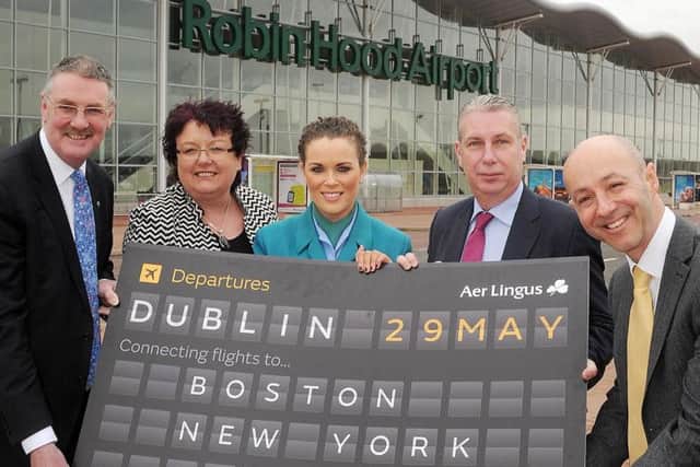 Richard Wright, Sheffield Chamber of Commerce, Jo Miller, Doncaster Council, Ciara O'Connor, Aer Lingus cabin crew, Peter O'Mara, Aer Lingus, and Steve Gill, Doncaster Airport, at the launch of transatlantic flights to the US from Doncaster Robin Hood Airport.