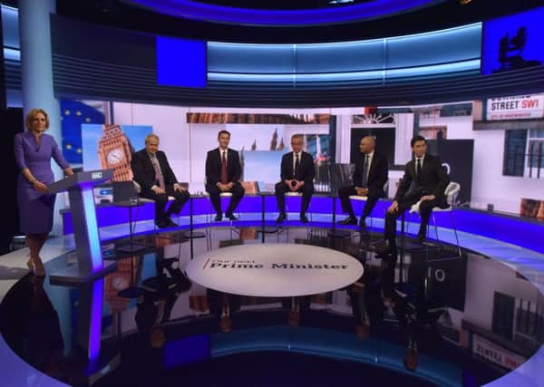 BBC presenter Emily Maitlis with gthe five Tory leadership contenders at last night's debate.