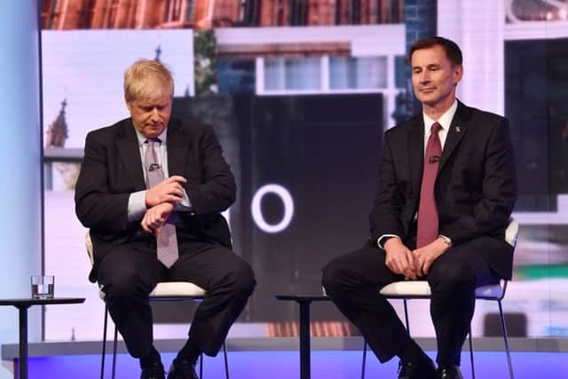 Boris Johnson and Jeremy Hunt both looked bored during the Tuesday night TV debate.