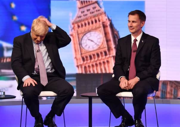 Foreign Secretary Jeremy Hunt (right) admitted social care cuts had gone too far during the Tory leader leadership debate with, amongst others Boris Johnson.