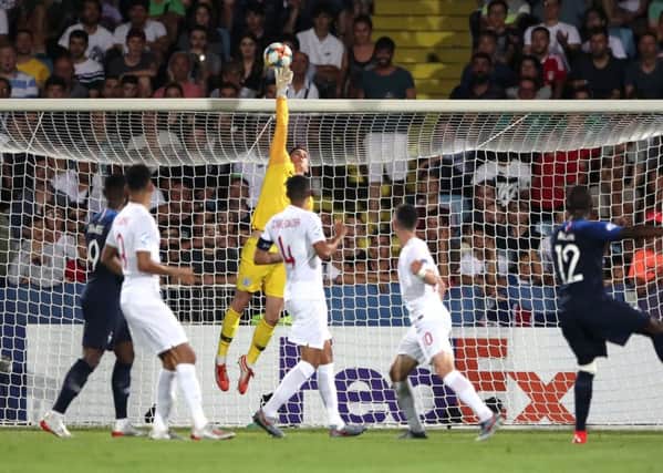 England U21 goalkeeper Dean Henderson tips a shot from France U21's Nanitamo Ikone over the crossbar during the UEFA European Under-21 Championship, Group C match at Dino Manuzzi, Cesena. (Picture: Nick Potts/PA Wire)