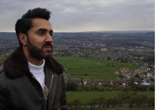 Mobeen Azhar was led back to the West Yorkshire townfollowing the shooting of Yassar Yaqub in January 2017.