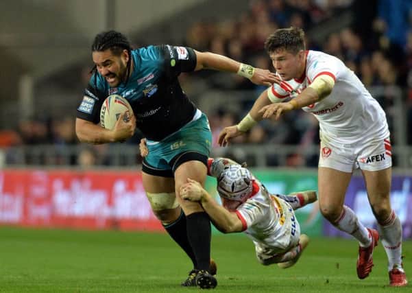 We'll meet again: Konrad Hurrell gets away from Theo Fages and Louie McCarthy-Scarsbrook during the first meeting of Saints and Leeds in February. (Picture: Bruce Rollinson)