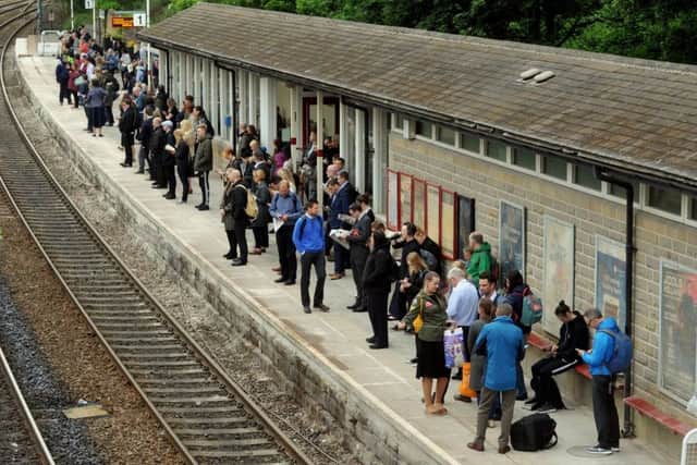 Stranded passengers wait for trains during last year's timetable turmoil in the North.