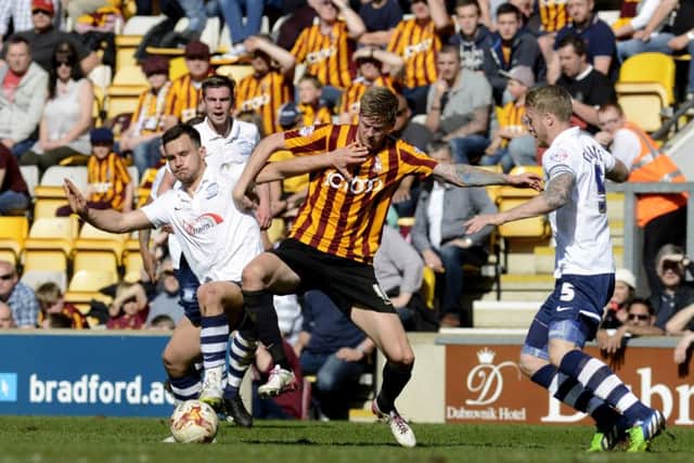 LONG-SERVING: Jon Stead battles for the ball while playing for Bradford City against Preston in April 2015.  Picture: Bruce Rollinson