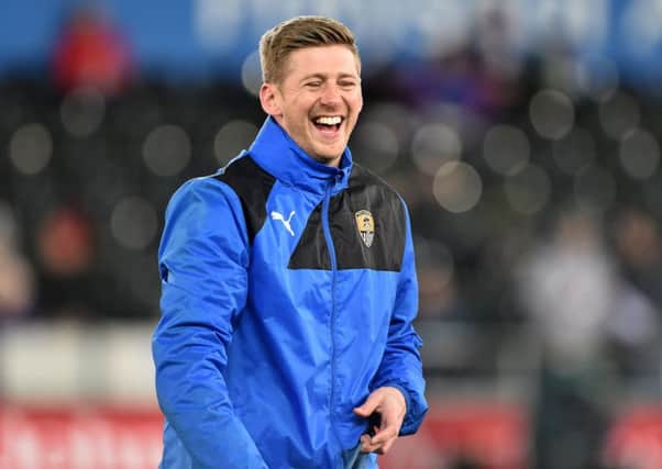 ENJOYING IT: Jon Stead, pictured warming up with Notts County before an FA Cup clash at Swansea City. Picture: Simon Galloway/PA