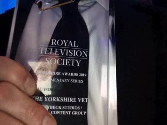 Julian Norton clutches the trophy during a successful night for The Yorkshire Vet at the Royal Television Society Awards.