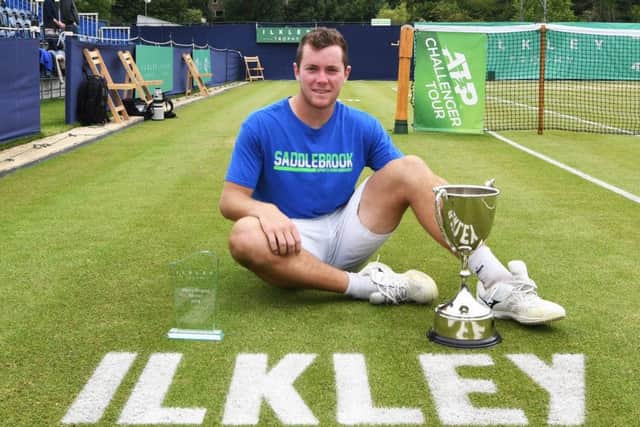Dominik Koepfer poses with the trophy after his men's final match against Dennis Novak at the Ilkley Trophy. (Photo by George Wood/Getty Images)