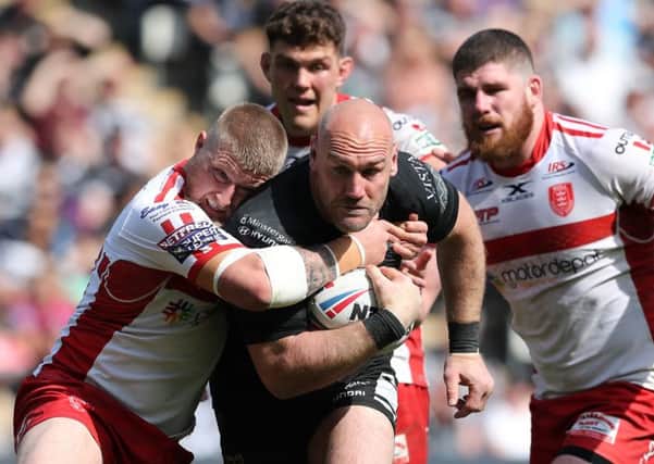 KEEP GOING: Gareth Ellis in action against Hull KR in April this year. Picture by Ash Allen/SWpix.com