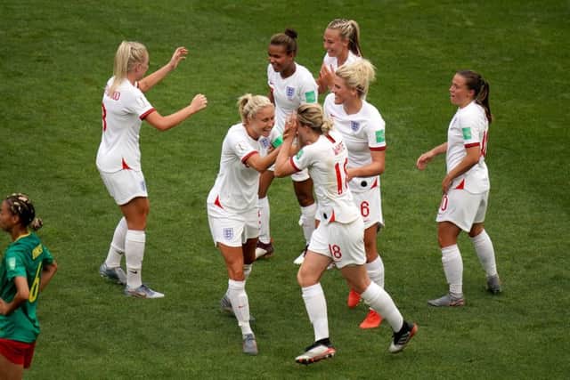 England's Ellen White celebrates scoring her side's second goal in Valenciennes on Sunday. Picture: John Walton/PA