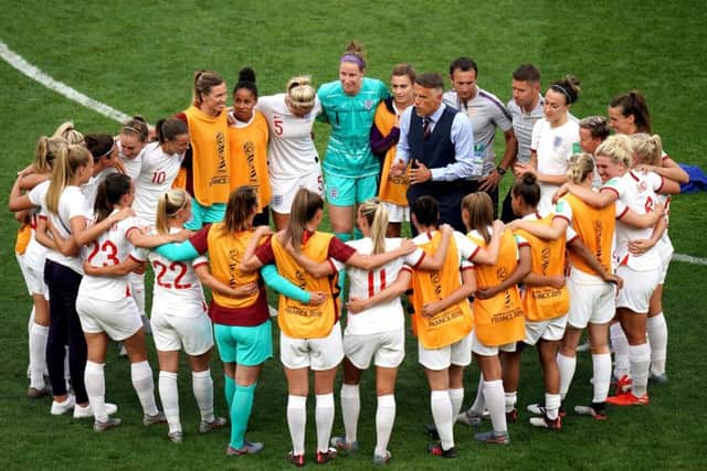 England's head coach Phil Neville speaks to his team after their win against Cameroon in Valenciennes. Picture: John Walton/P