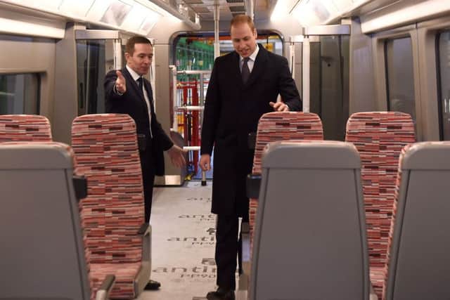The Duke of Cambridge inpsects a new Crossrail train - even though they're sitting idle.