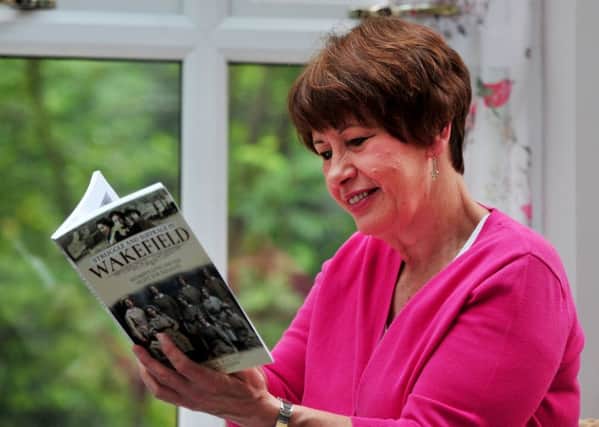 Author Gaynor Haliday with her new book 'Struggle and Suffrage in Wakefield'. Picture Gerard Binks