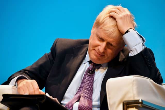 Boris Johnson looked distracted during last Saturday's leadership hustings in Birmingham.