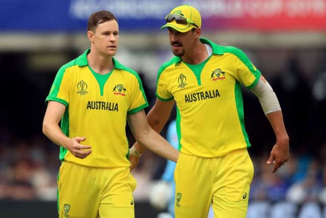 DREAM TEAM: Australia's Jason Behrendorff celebrates with Mitchell Starc (right) after taking the wicket of England's Chris Woakes at Lord's. Picture: Adam Davy/PA