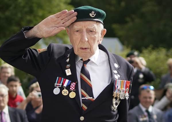 D-Day veteran Reg Charles, aged 96, the last surviving member of the heroic glider assault on Pegasus Bridge salutes during a memorial ceremony at the Pegasus Bridge Museum on June 05, 2019 in Caen, D-Day Marie Scott was a 17-year-old D-Day switchboard operator at Southwick House, Operation Overlord HQ in Portsmouth. Veterans, families, visitors and military personnel are gathering in Normandy on June 6th to commemorate the 75th anniversary of the invasion, which heralded the Allied advance towards Germany and victory about 11 months later.