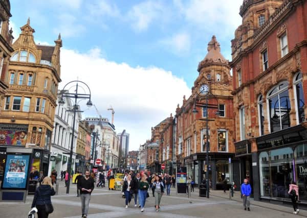 Shoppers on Briggate in Leeds. UK's retail environment is the most challenging since 1991, according to Colliers International.