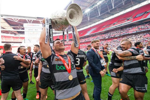 Mark Minichiello hoists the Challenge Cup for a second time with Hull FC in 2017. (SWPix)