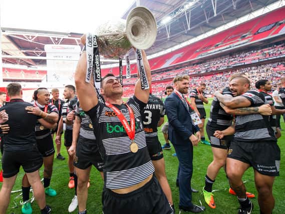 Mark Minichiello hoists the Challenge Cup for a second time with Hull FC in 2017. (SWPix)
