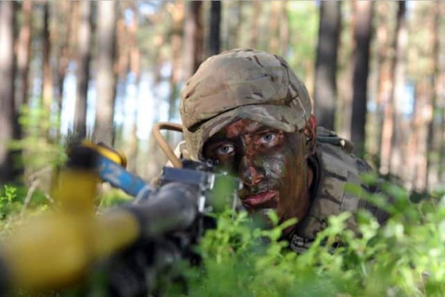 Rifleman Tom Pollard from Brighouse with the 3rd Rifles on a multi national NATO exercise at Pabrade Army training area in Lithuania. Picture: Tony Johnson.