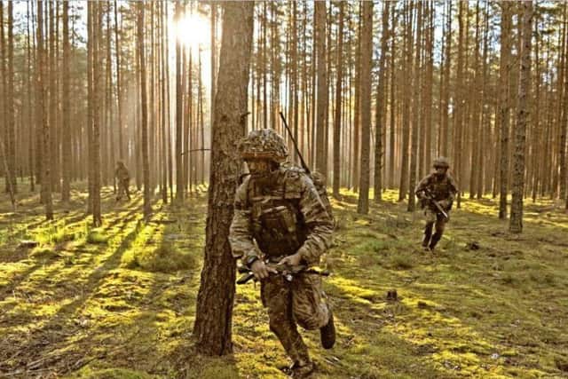 A light infantryman with the 3rd Rifles engages with the enemy on a multi national NATO exercise at Pabrade Army training area in Lithuania. Picture: Tony Johnson.