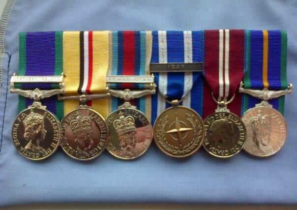 Adam's medals for service