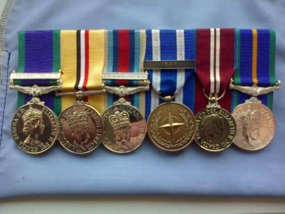 Adam's medals for service