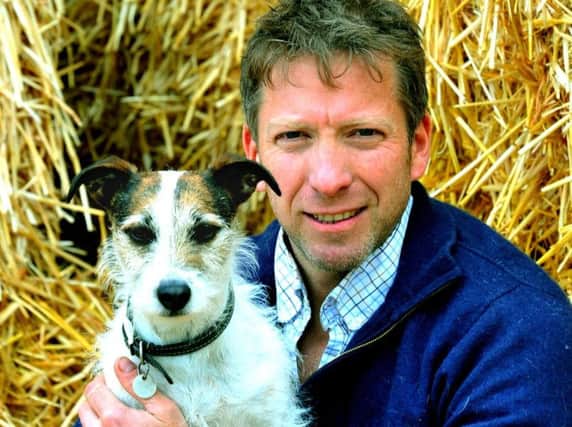 Julian Norton with his dog Emmy. Picture by Gary Longbottom.