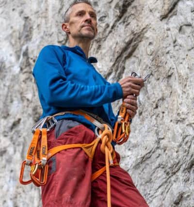 Date: 10th May 2019.
Pivcture James Hardisty.
Climbing feature at one of the UK's best climbing walls Malham Cove, in the heart of the Yorkshire Dales, near Skipton. Pictured Sport climber Steve McClure, preparing to ascend the near vertical cliff face of Malham cove.