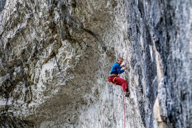 Date: 10th May 2019.
Pivcture James Hardisty.
Climbing feature at one of the UK's best climbing walls Malham Cove, in the heart of the Yorkshire Dales, near Skipton. Pictured Sport climber Steve McClure, ascending the near vertical cliff face of Malham cove.