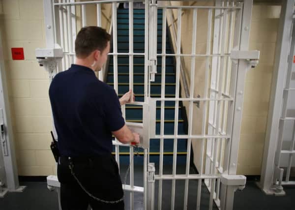 Does the imprisonment of criminals make reoffending more or less likely?