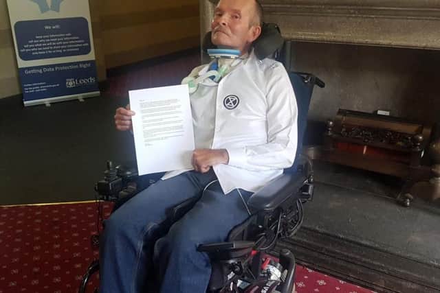 Climate change activist Nick Hodgkinson, who suffers from motor neurone disease, with a letter to the chair of the Leeds City Council climate change committee Coun Neil Walshaw.