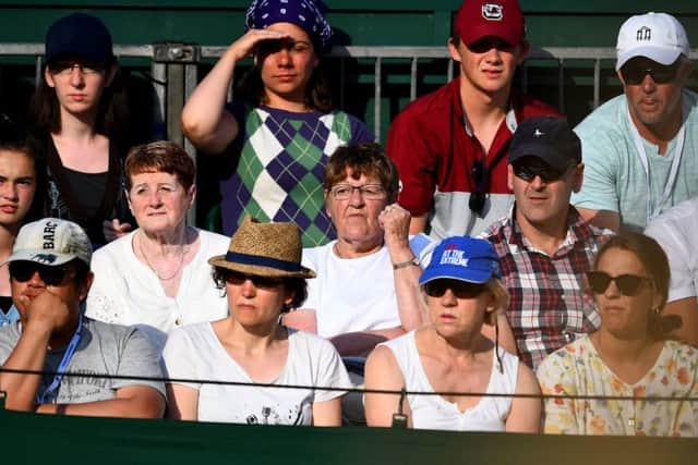 Paul Jubb's grandmother Valerie (centre) on day two at Wimbledon. Picture : Victoria Jones/PA