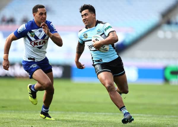 QUALITY: Sosaia Feki of the Sharks runs in for a try for Cronulla Sharks against Canterbury Bulldogs  in September last year. Picture: Mark Metcalfe/Getty Images.