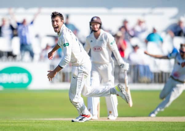 Yorkshire's Duanne Olivier celebrates as he takes the final wicket of Surrey's Gareth Batty to seal victory for his side.