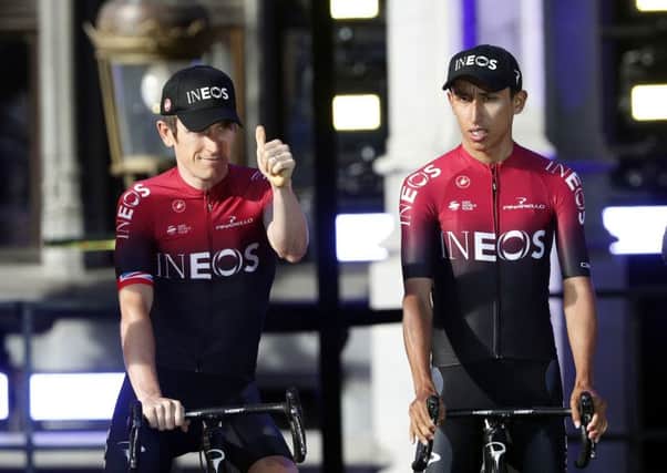 Britain's Geraint Thomas, left, and Colombia's Egan Bernal Gomez pose during the Tour de France cycling race team presentation at the Grand Place in Brussels, Thursday, July 4, 2019, ahead of upcoming Saturday's start of the race. (AP Photo/Thibault Camus)