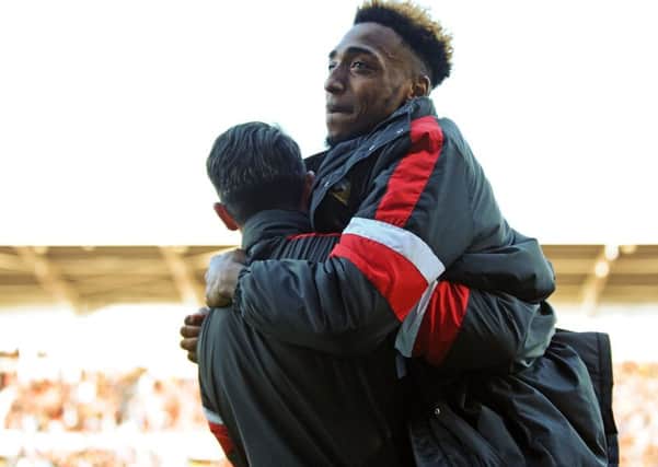 Mallik Wilks, pictured celebrating fr Doncaster Rovers last season, is joining Barnsley. (Picture: Marie Caley)