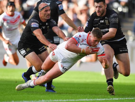 St Helens' Morgan Knowles scores his team's opening try at Hull FC.
(PIC: Dave Howarth/PA Wire)