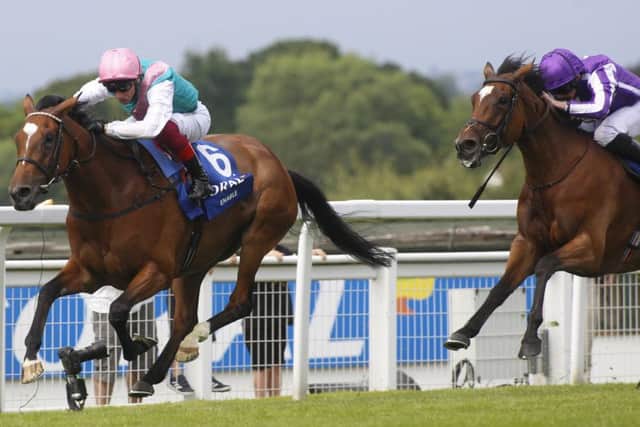 The Frankie Dettori-ridden Enable pulls clear of Magical in the Coral-Eclipse.