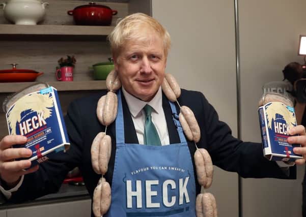 Boris with his Bangers: The Tory leadership hopeful visited Heck's sausage factory in North Yorkshire. Pic: PA