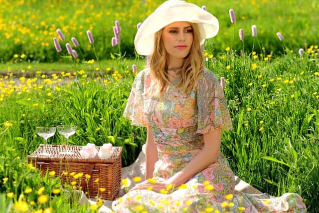 Picture: Simon Hulme
, Styling: Stephanie Smith
, Clothes and accessories: Catherine Smith Vintage Fashion


Elisha wears 1970s floral maxi dress with fan sleeves, £75; vintage straw hat, £25. Picnic hamper from Bettys.


At Harlow Carr Gardens,