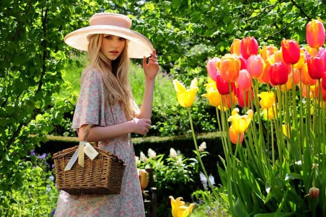 Picture: Simon Hulme 
Styling: Stephanie Smith
 Clothes and accessories: Catherine Smith Vintage. Charlie wears: 1970s floral dress by Susan Small, £95; pale pink straw brimmed hat with lace crown, £35; picnic hamper from Bettys, at Harlow Carr Gardens, Harrogate.