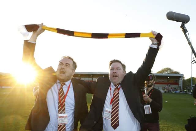Edin Rahic (left) and Stefan Rupp celebrate Bradford's League One playoff semi-final victory over Fleetwood in May 2017. Picture: Martin Rickett/PA
