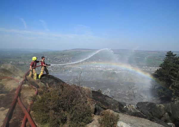Firefighters tackling a large blaze on Ilkley Moor on Easter Saturday.