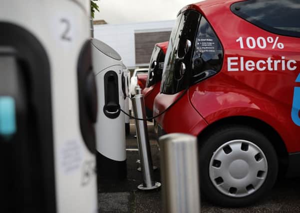 When will electric cars replace petrol or diesel-powered vehicles on Britain's roads?
