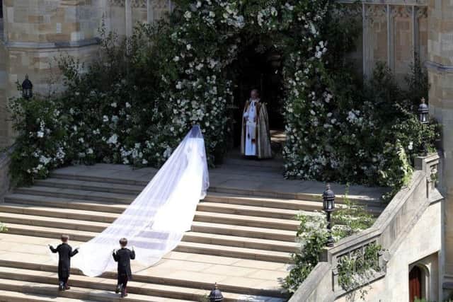 Meghan Markle arrives at St George's Chapel, Windsor, on her wedding day but has she lost public support?