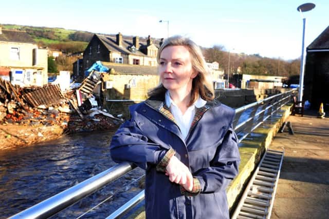 Liz Truss visits Yorkshire after the December 2016 floods.