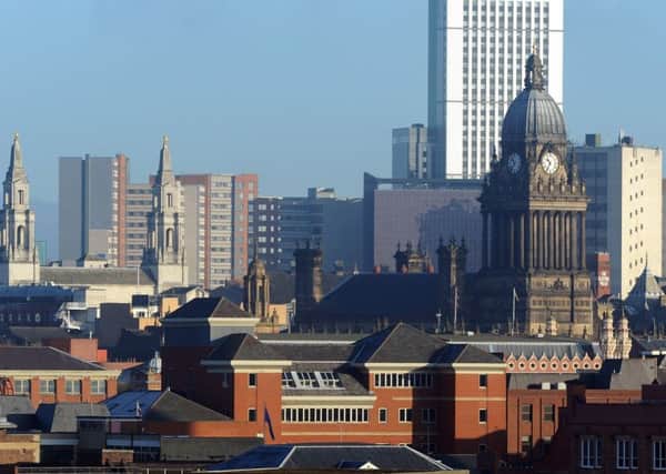 10 January 2013......      Leeds Civic Hall and Leeds Town Hall in the city centre skyline
