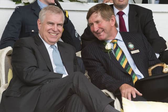 Prince Andrew enjoying watching the heavy horses in the main ring at the Great Yorks Show with Show Director Charles Mills.  Picture:  Kate Mallender