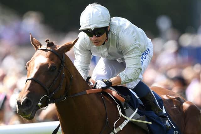Communique ridden by jockey Silvestre de Sousa coming home to win the Princess Of Wales's Tattersalls Stakes during day one of the Moet and Chandon July Festival 2019 at Newmarket Racecourse.